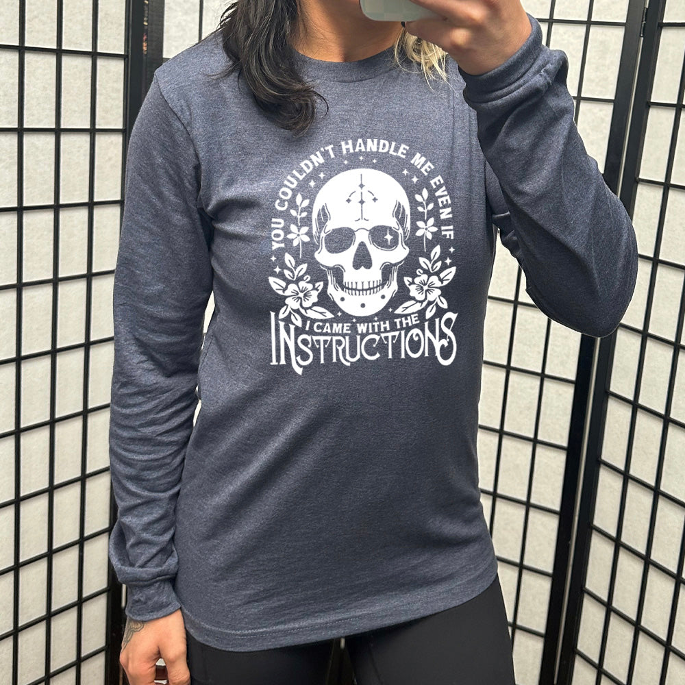 heather navy long sleeve shirt with the text "You Couldn't Handle Me Even If I Came With The Instructions" on it, with the graphic of a skull, with some flowers around it