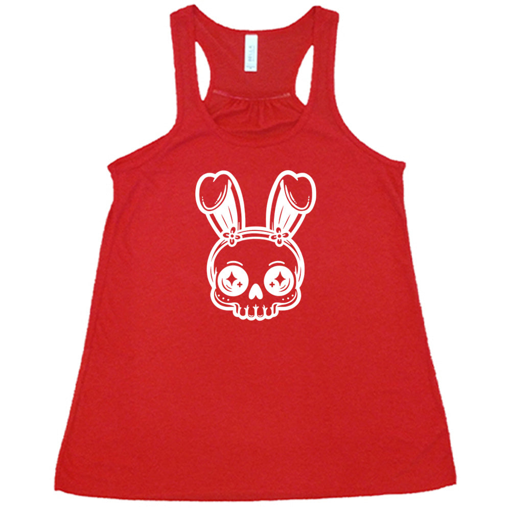 Red colored flowy tank with a bunny skull graphic on it