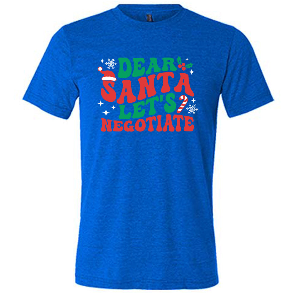 blue unisex tee with the words "dear Santa let's negotiate" with some snowflakes, stars, and a candy cane