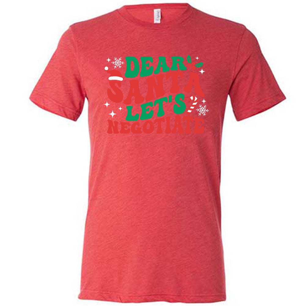 red unisex tee with the words "dear Santa let's negotiate" with some snowflakes, stars, and a candy cane
