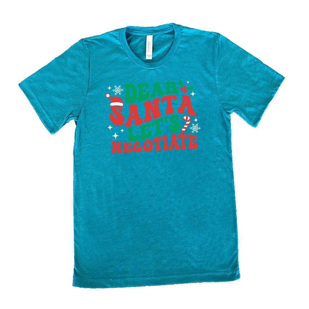 teal unisex tee with the words "dear Santa let's negotiate" with some snowflakes, stars, and a candy cane