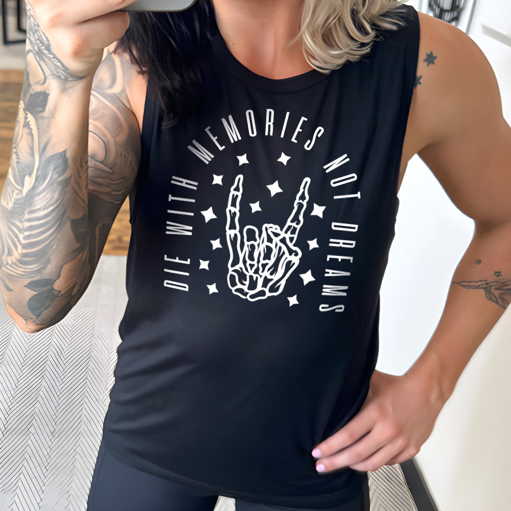 black muscle tank with the graphic of a rocker skeleton hand, surrounded by little stars as well as an archway of text saying "die with memories not dreams" 
