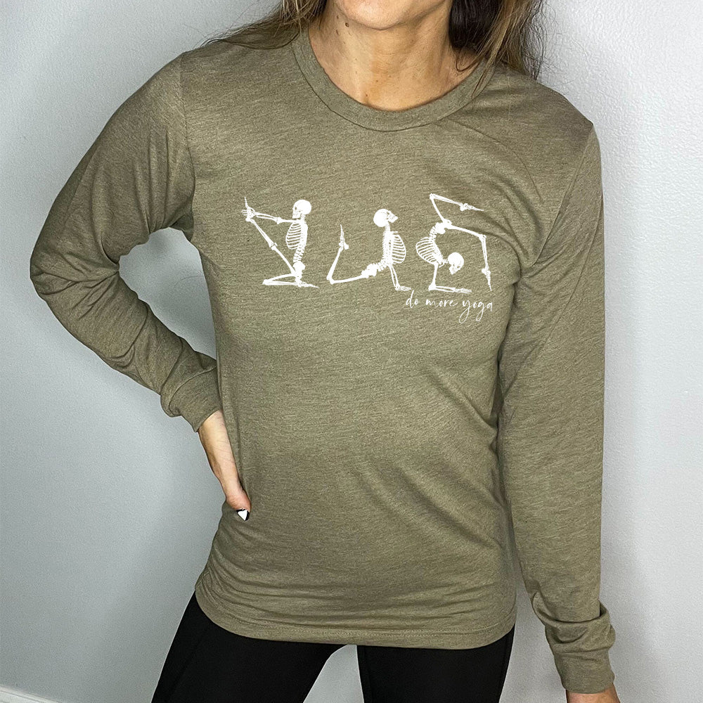 heather olive long sleeve shirt with three skeleton graphics doing yoga, with the small words underneath saying "do more yoga"