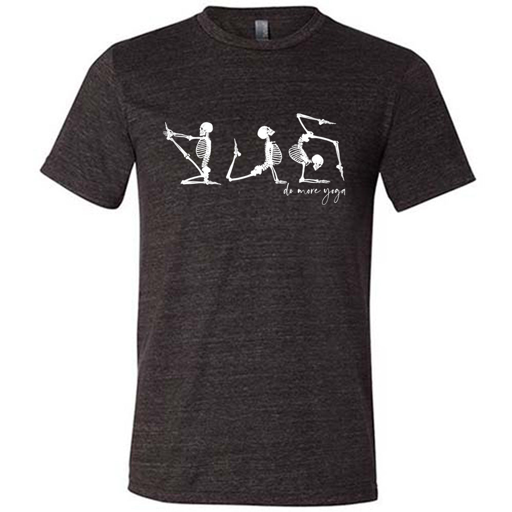 black unisex tee with three skeleton graphics doing yoga, with the small words underneath saying "do more yoga"