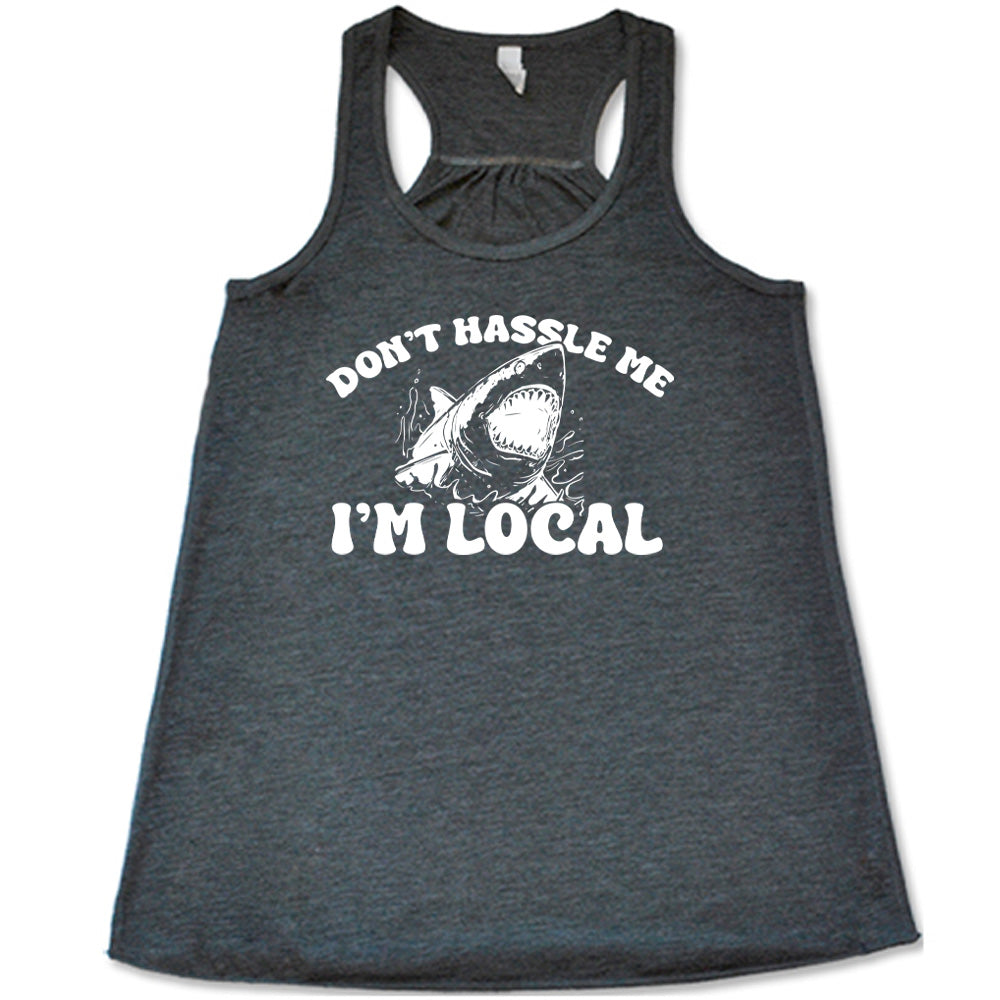 Grey colored flowy tank with a shark graphic on it that says "Don't Hassle Me I'm Local" 