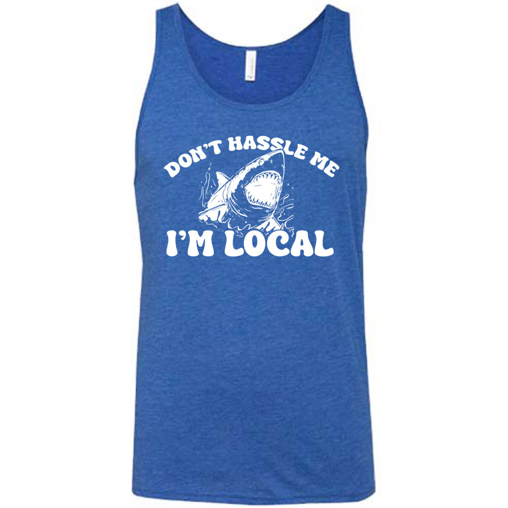 Blue colored tank with a shark graphic on it that says "Don't Hassle Me I'm Local" 