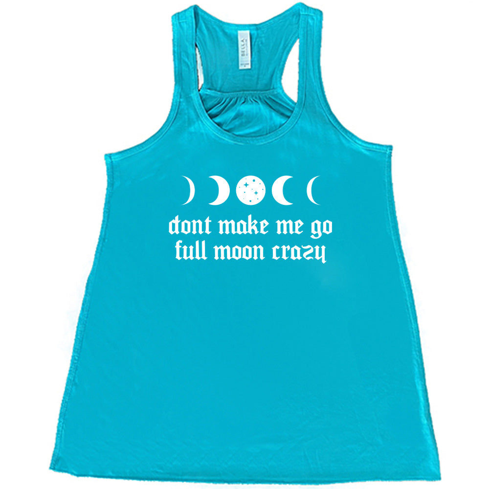 Teal colored flowy tank with a moon cycles graphic on it that says "Don't Make Me Go Full Moon Crazy" 