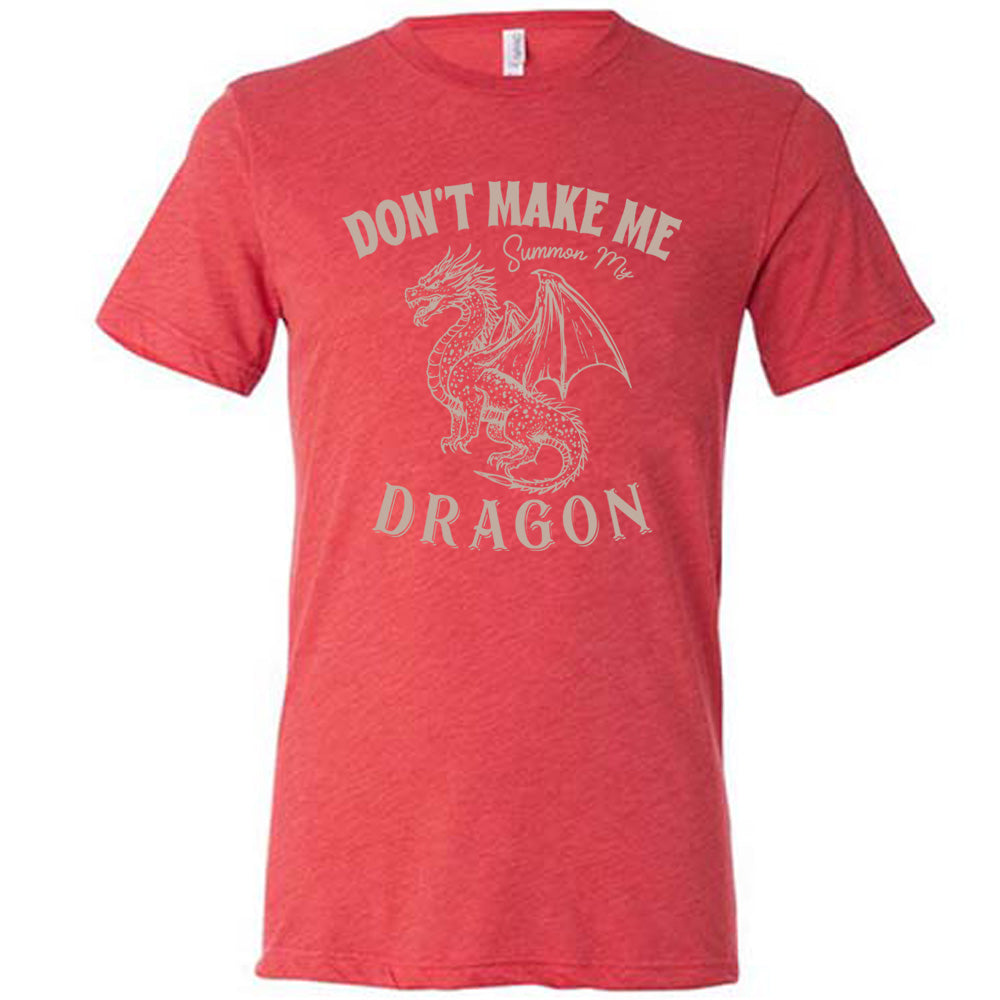 red unisex tee with the words "don't make me summon my dragon" on it, surrounding the graphic of a fierce-looking dragon