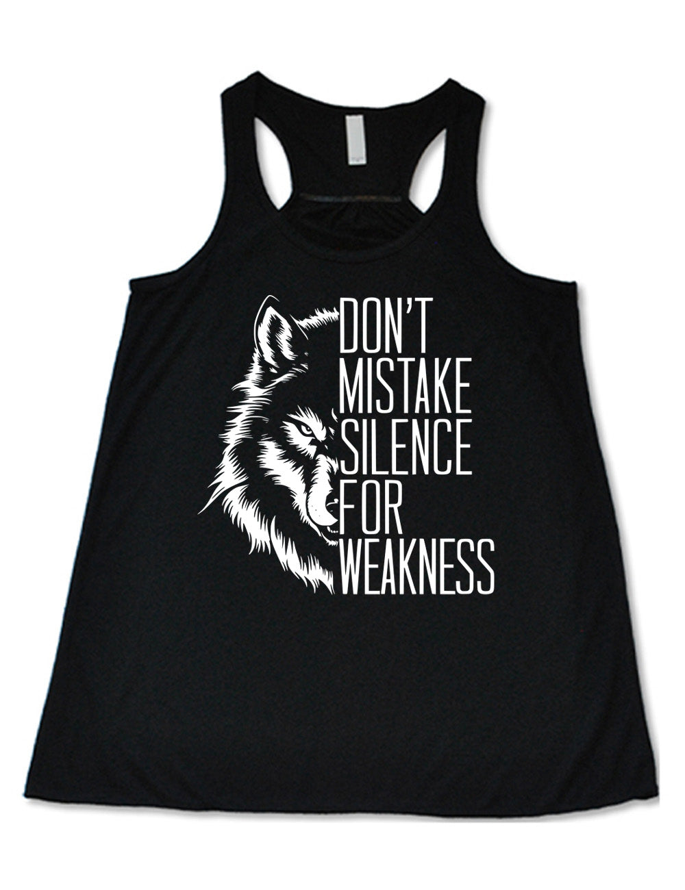 black flowy racerback tank with the graphic of half a wolf's head, and the words "don't mistake silence for weakness" making up the other half