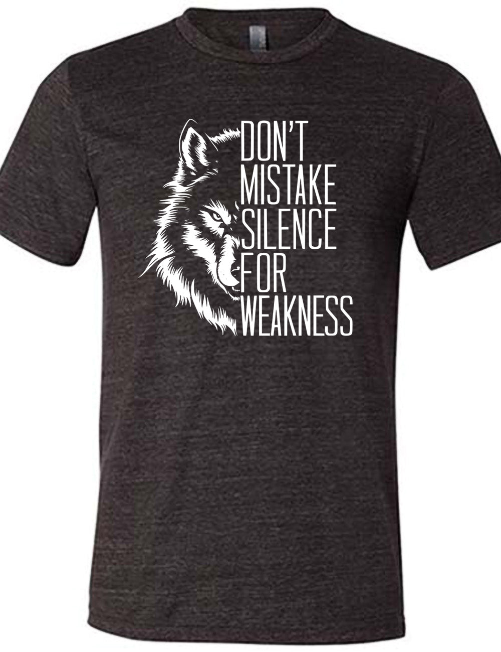 black unisex tee with the graphic of half a wolf's head, and the words "don't mistake silence for weakness" making up the other half