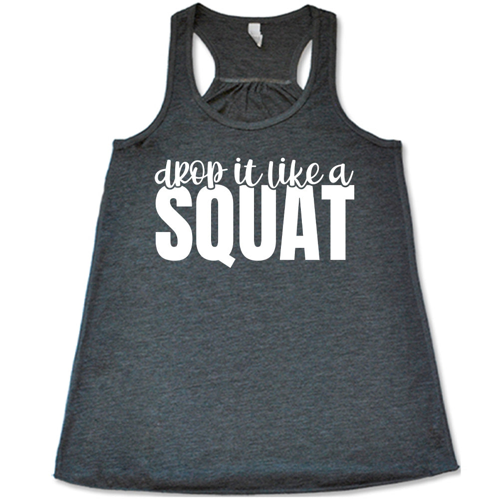 Grey flowy tank with Drop it Like a Squat in white lettering
