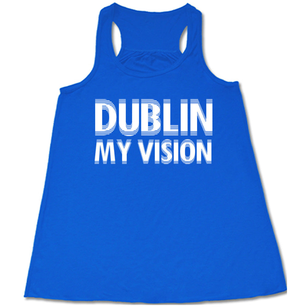 blue flowy tank with the words "dublin my vision" on it, displayed in a way to cause the optical illusion of blurred, doubled vision