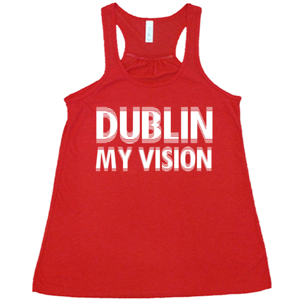 red flowy tank with the words "dublin my vision" on it, displayed in a way to cause the optical illusion of blurred, doubled vision