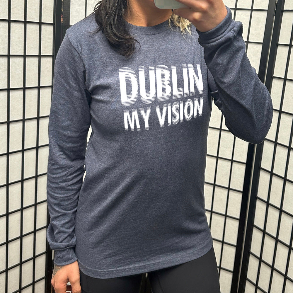 heather navy long sleeve with the words "dublin my vision" on it, displayed in a way to cause the optical illusion of blurred, doubled vision