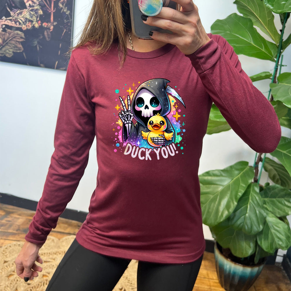 heather cardinal long sleeve tee with the text "Duck You!" on it, with the graphic of a cartoon grim reaper, giving the peace sign, and holding a duckling