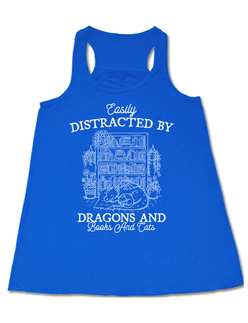 blue flowy racerback tank with words on it saying "Easily distracted by dragons and books and cats" around the graphic of a detailed large, full bookcase, with plants hanging and placed beside it, and a dragon curled up in front of it