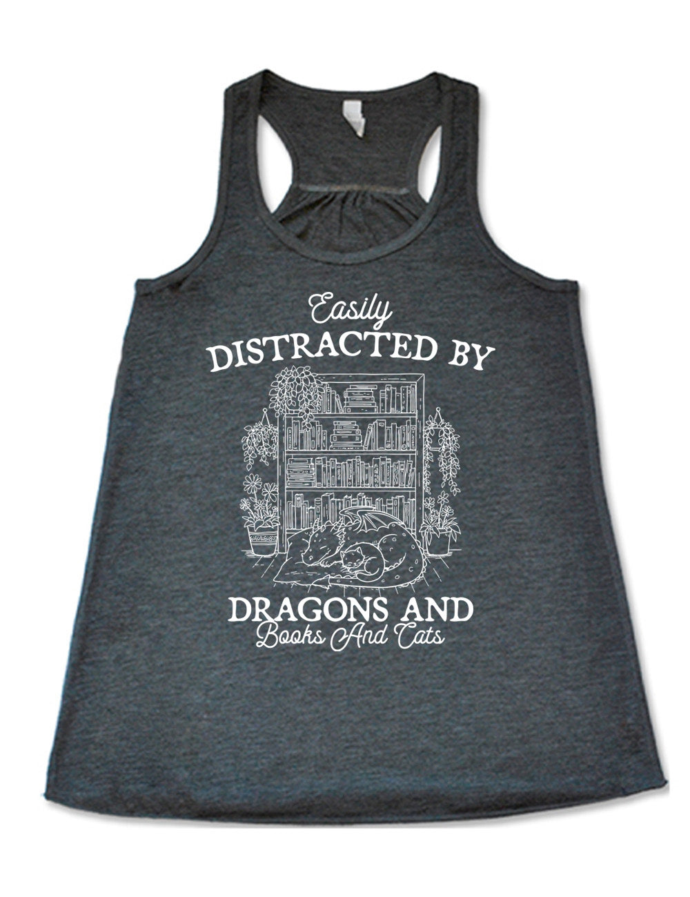 grey flowy racerback tank with words on it saying "Easily distracted by dragons and books and cats" around the graphic of a detailed large, full bookcase, with plants hanging and placed beside it, and a dragon curled up in front of it