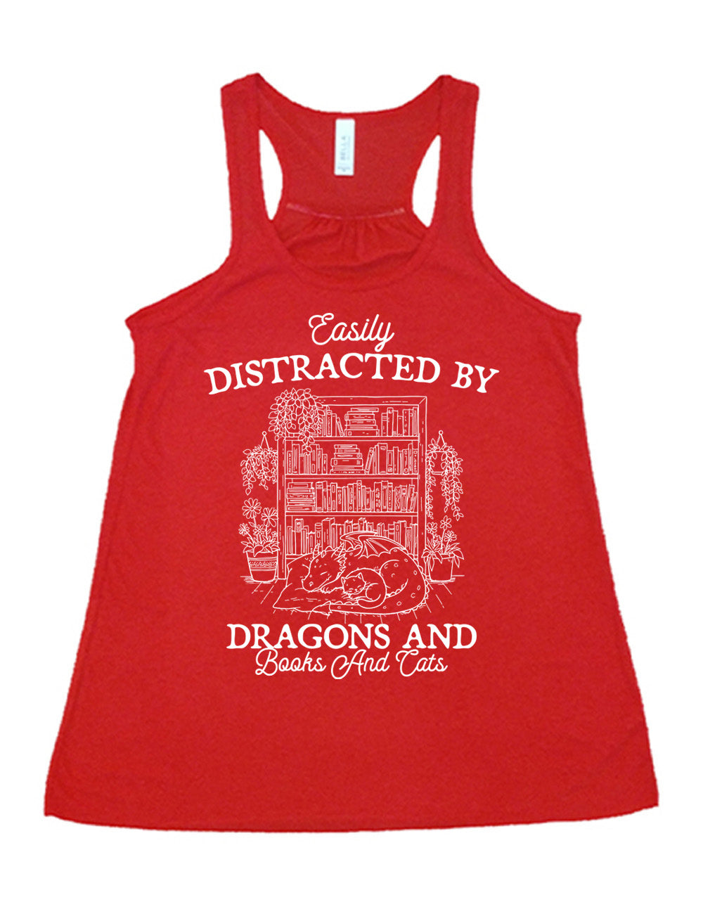 red flowy racerback tank with words on it saying "Easily distracted by dragons and books and cats" around the graphic of a detailed large, full bookcase, with plants hanging and placed beside it, and a dragon curled up in front of it