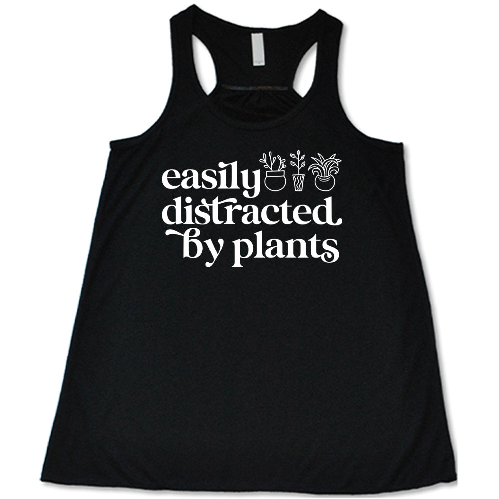 Black colored flowy tank with a potted plant graphic on it that says "Easily Distracted By Plants"