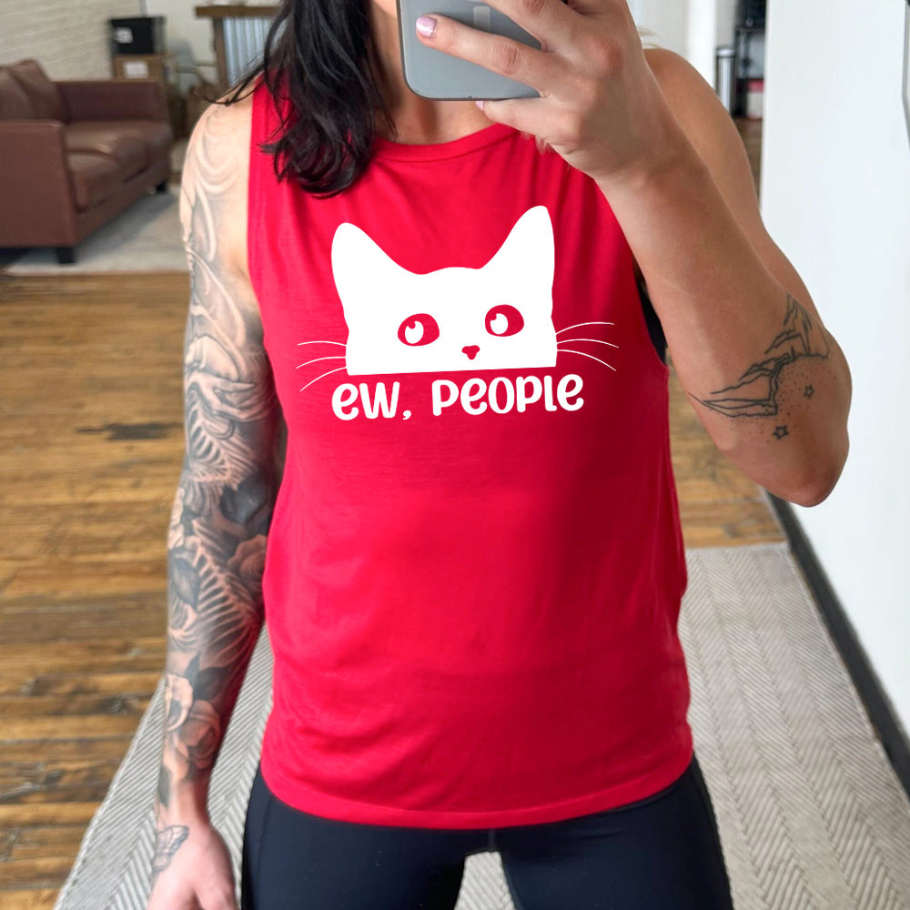 Model wearing red colored muscle tank with cat rolling eyes graphic on it that says "ew, people"