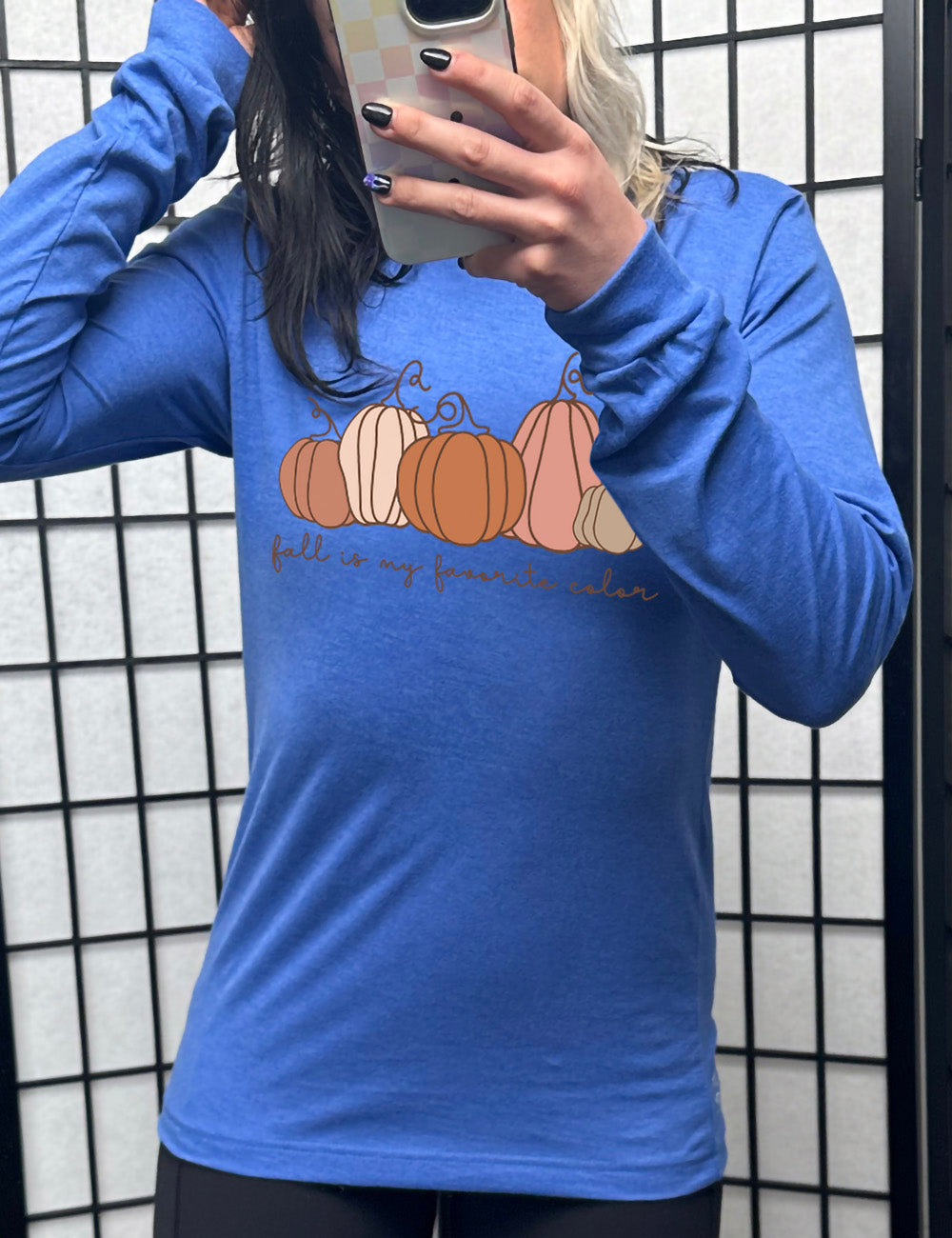 heather true royal long sleeve shirt with the graphic of five pumpkins of varied shape and color, and the small words underneath saying "fall is my favorite color"