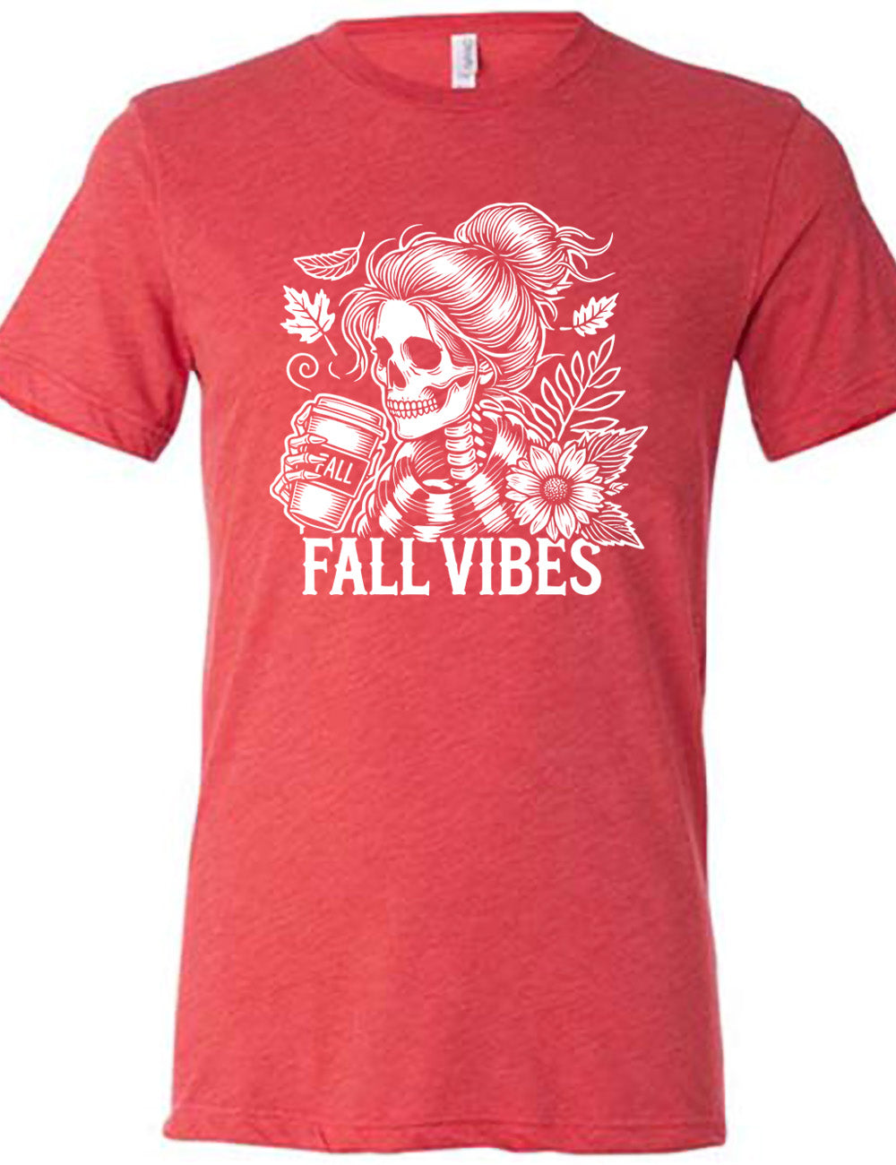 red unisex tee with the graphic of a skeletal woman, with her hair in a bun, holding a takeaway coffee cup labeled "fall", with a flower and leaves next to her, and the words underneath saying "fall vibes"