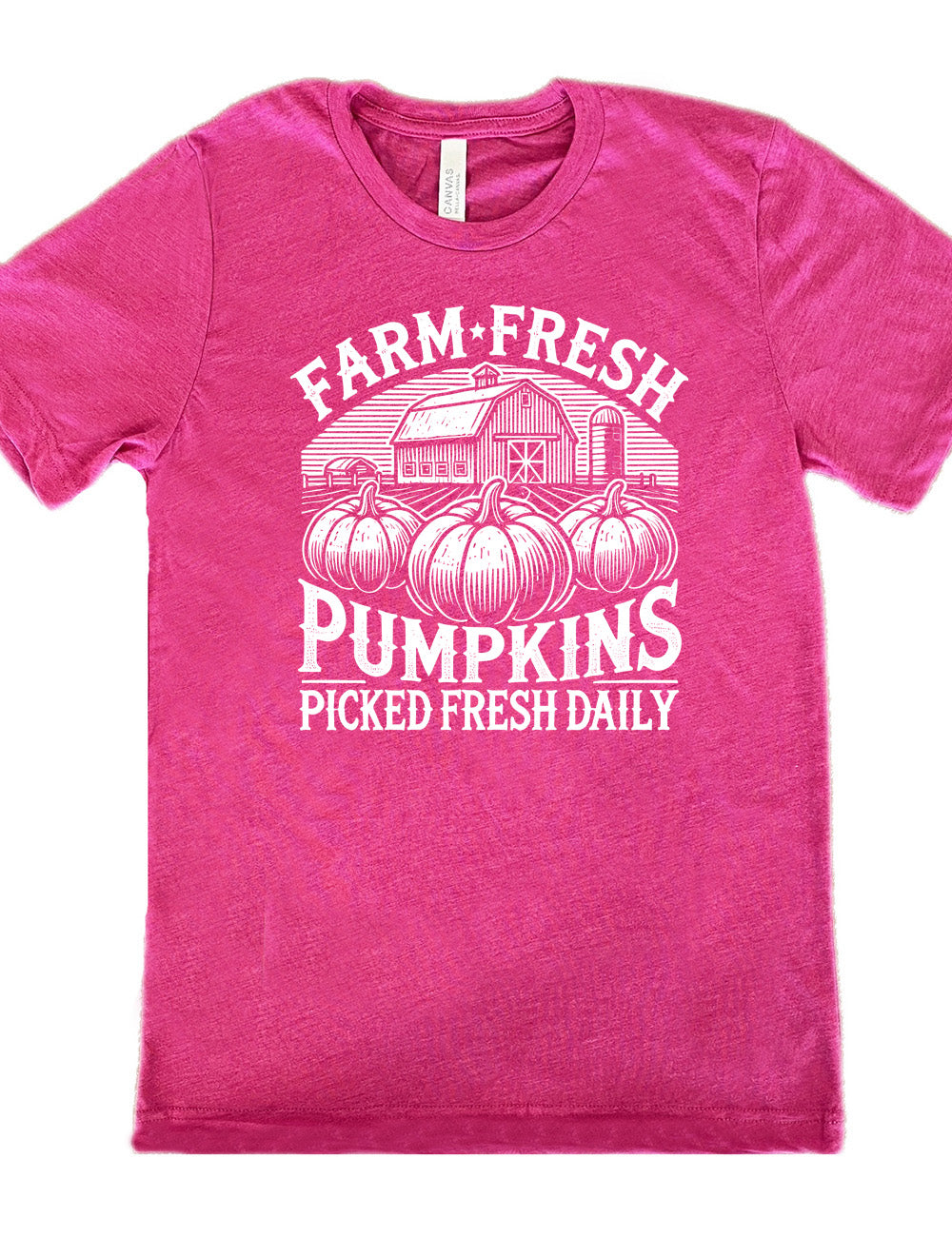 berry unisex tee with the words "farm fresh pumpkins picked fresh daily" around the graphic of a barn in the background and three pumpkins in the foreground