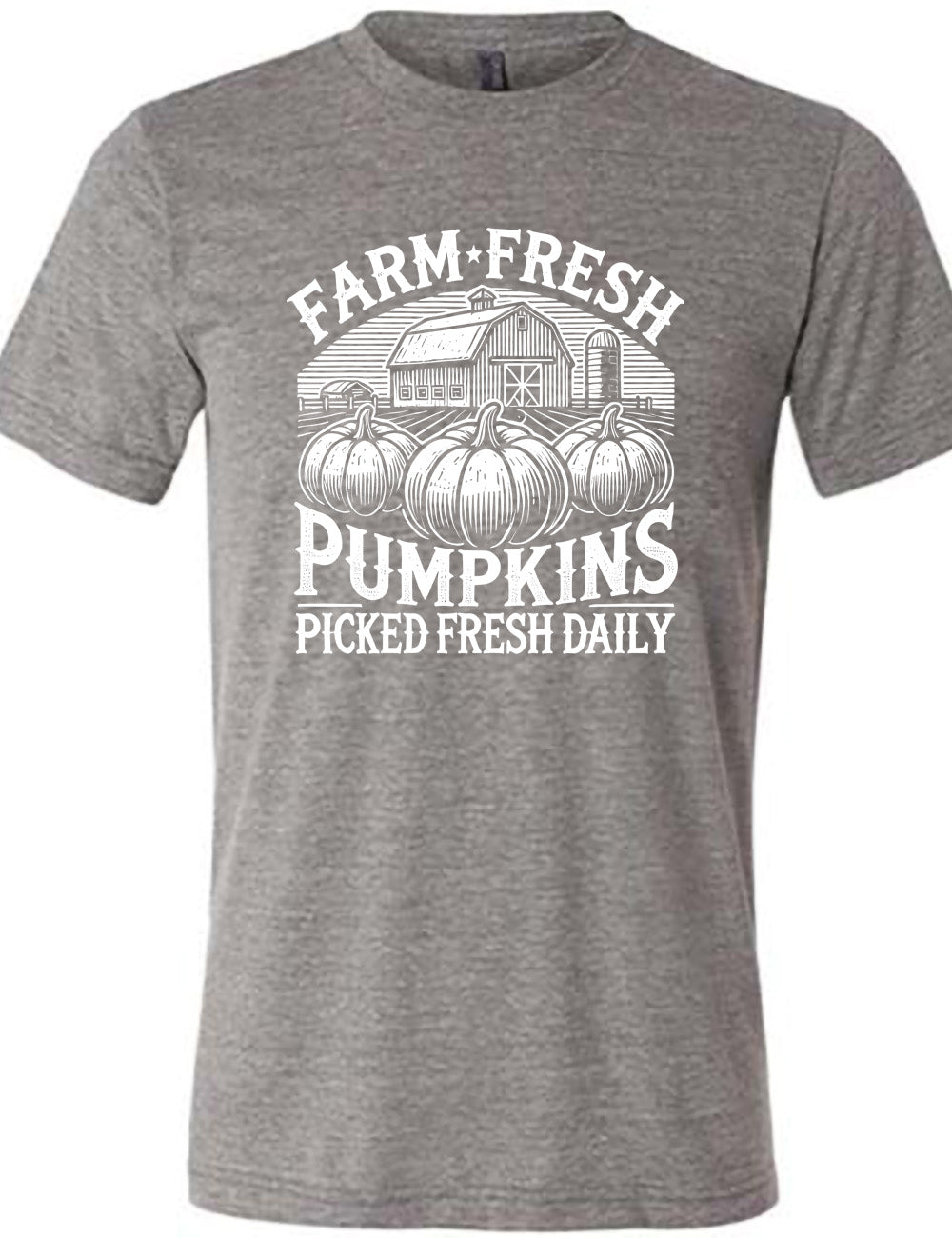 grey unisex tee with the words "farm fresh pumpkins picked fresh daily" around the graphic of a barn in the background and three pumpkins in the foreground