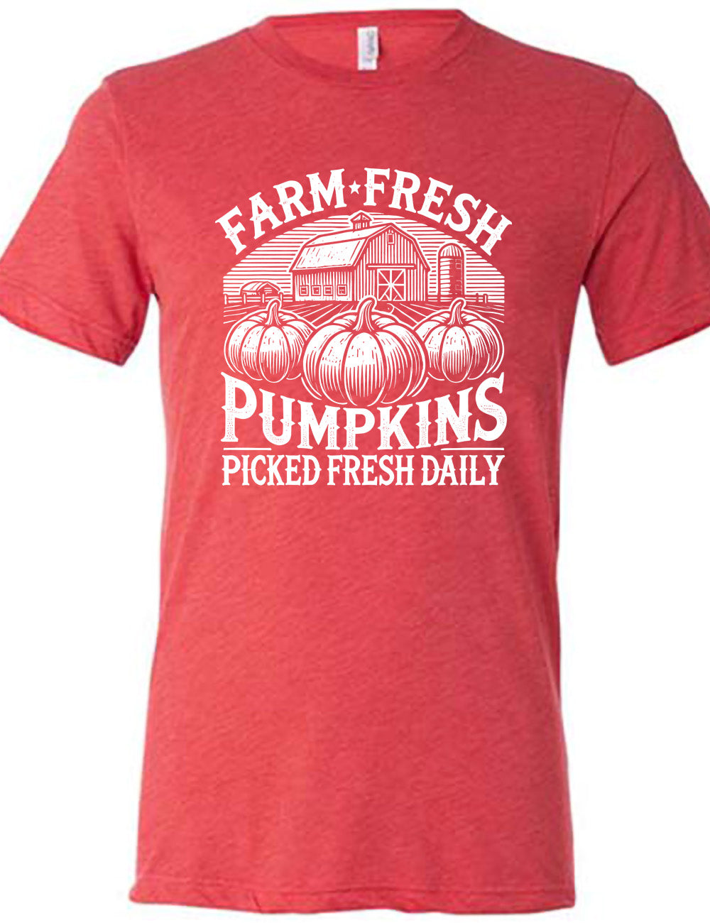 red unisex tee with the words "farm fresh pumpkins picked fresh daily" around the graphic of a barn in the background and three pumpkins in the foreground