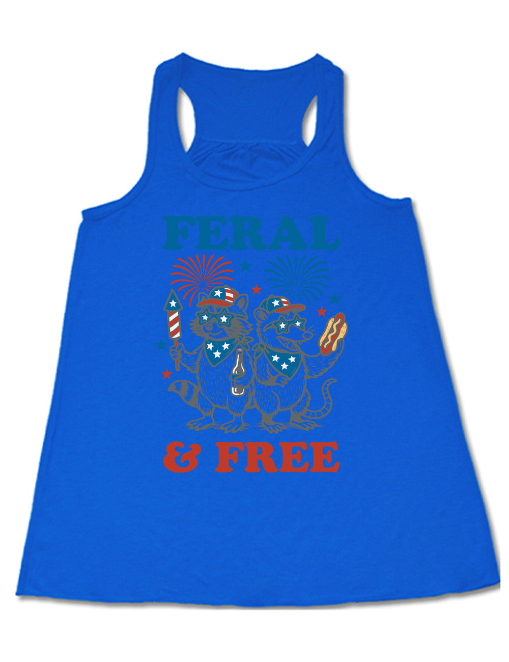 blue flowy racerback tank with the words "feral & free" around the graphic of two racoons, both wearing American flag hats, sunglasses, and bandanas, one holding a firework and a beer bottle, the other holing a hotdogs, and fireworks going off above, and a few little stars
