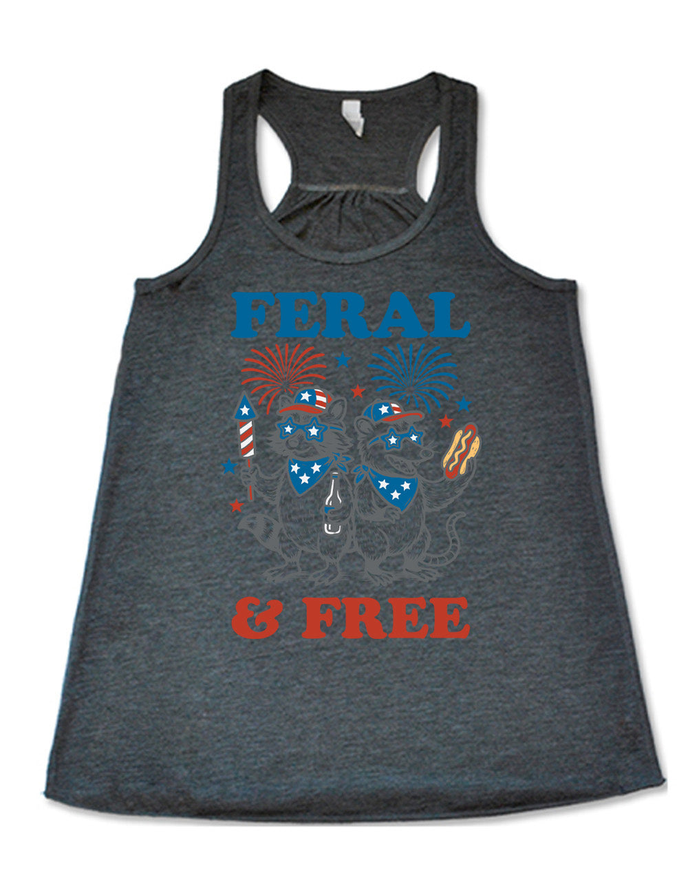 grey flowy racerback tank with the words "feral & free" around the graphic of two racoons, both wearing American flag hats, sunglasses, and bandanas, one holding a firework and a beer bottle, the other holing a hotdogs, and fireworks going off above, and a few little stars