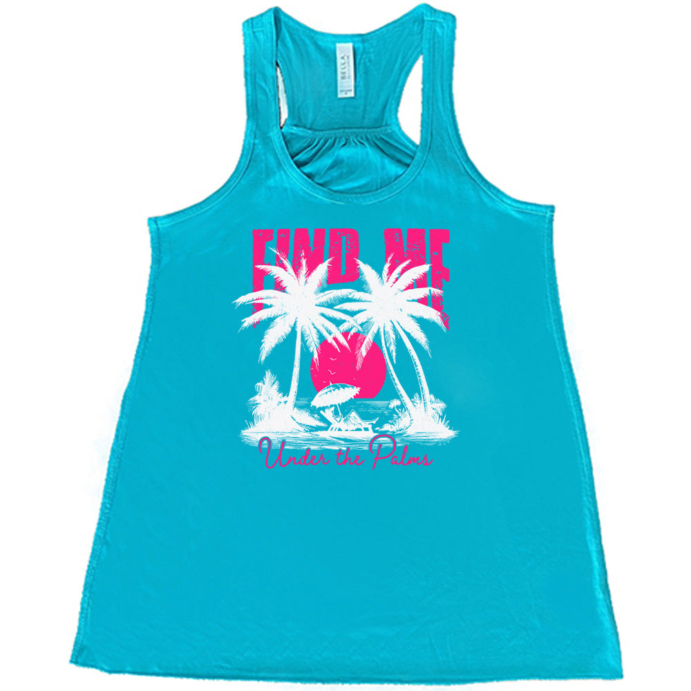 Teal colored flowy tank with a beach and palm trees graphic on it that says "Find Me Under The Palms" 
