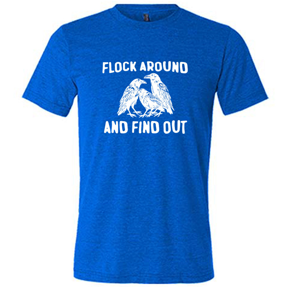 Blue colored shirt with flock of birds graphic on it that says "Flock Around And Find Out"