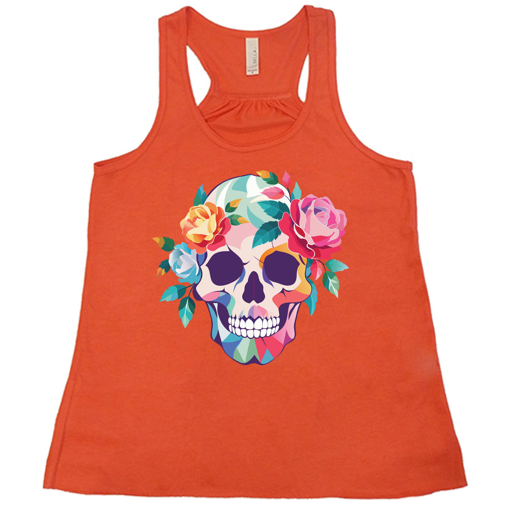 coral flowy racerback tank with the colorful graphic of a skull, with flowers adorning it's head