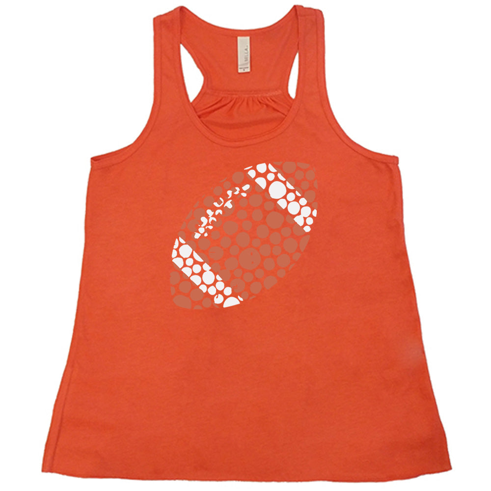 Coral colored flowy tank with football made up of dots graphic on it