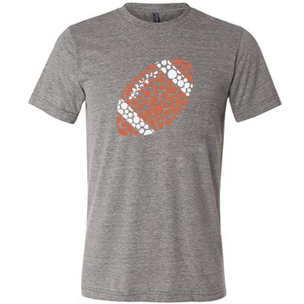Grey colored shirt with football made up of dots graphic on it