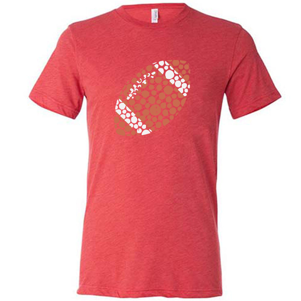 Red colored shirt with football made up of dots graphic on it