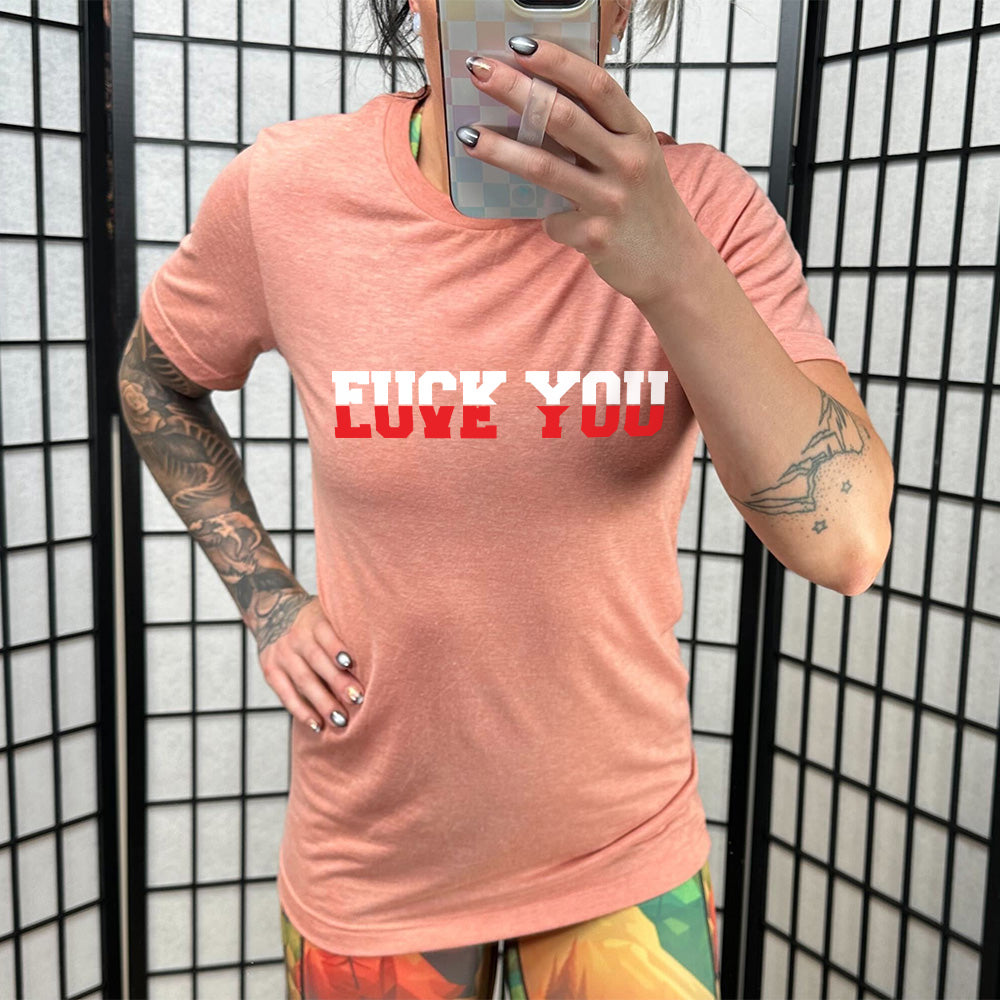 sunset unisex tee with the words "Fuck You Love You" on it, blended together, differentiated by white and red coloring