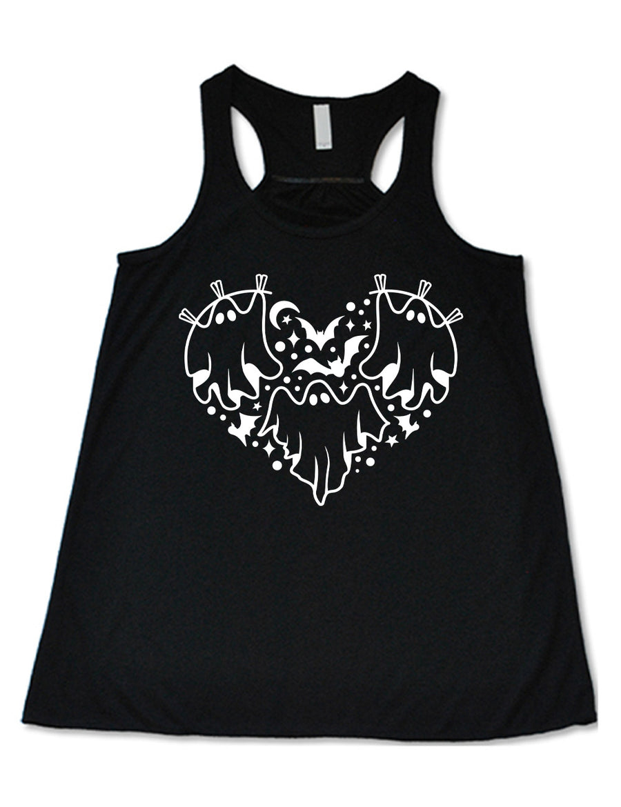 black flowy racerback tank with the graphic of a heart that is made up of three ghosts, bats, stars, dots and a moon