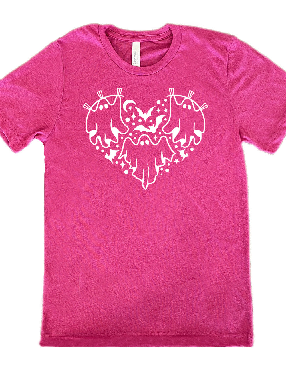 berry unisex tee with the graphic of a heart that is made up of three ghosts, bats, stars, dots and a moon