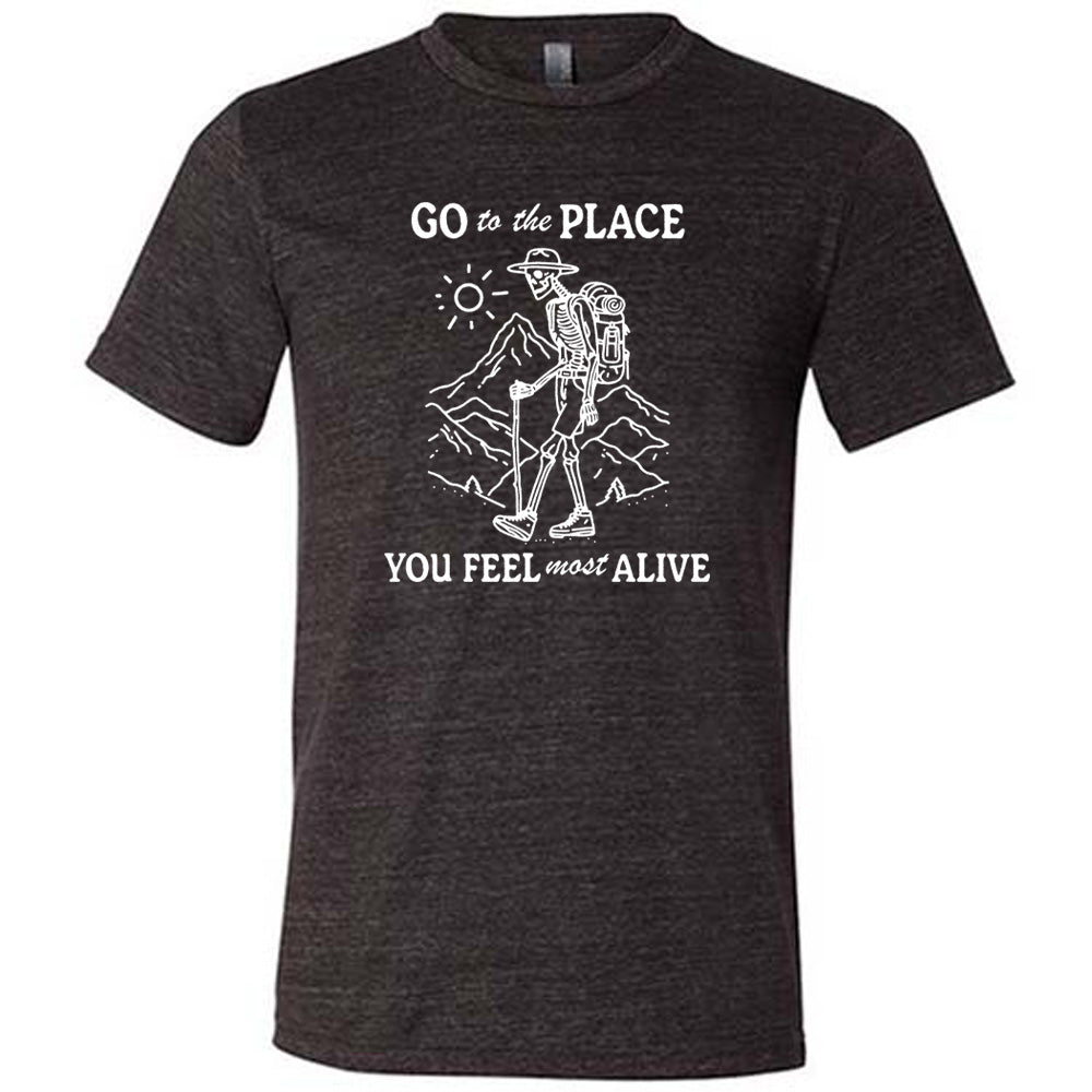Black colored shirt with a skeleton on a hike graphic on it that says "Go To The Place You Feel Most Alive" 