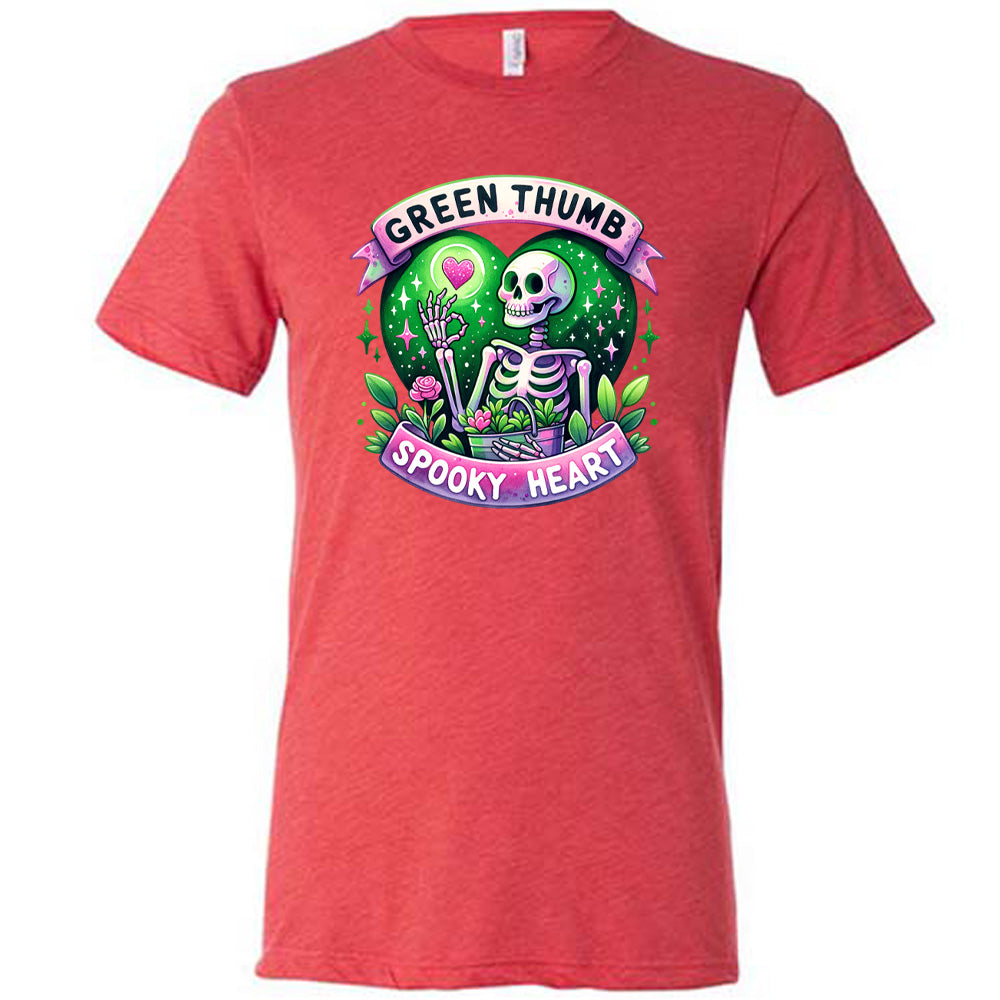 Red colored shirt with a skeleton and plants graphic on it that says "Green Thumb Spooky Heart"