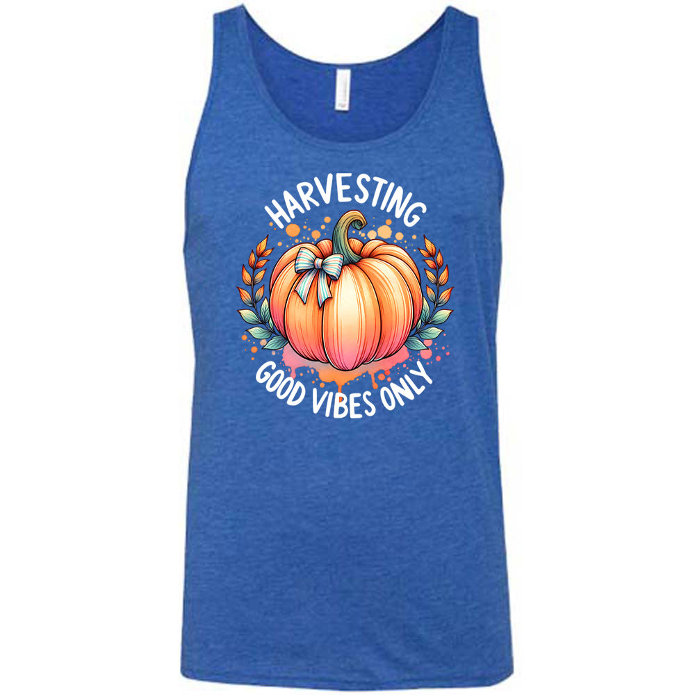 Blue colored tank with pumpkin graphic on it that says "Harvesting Good Vibes Only"