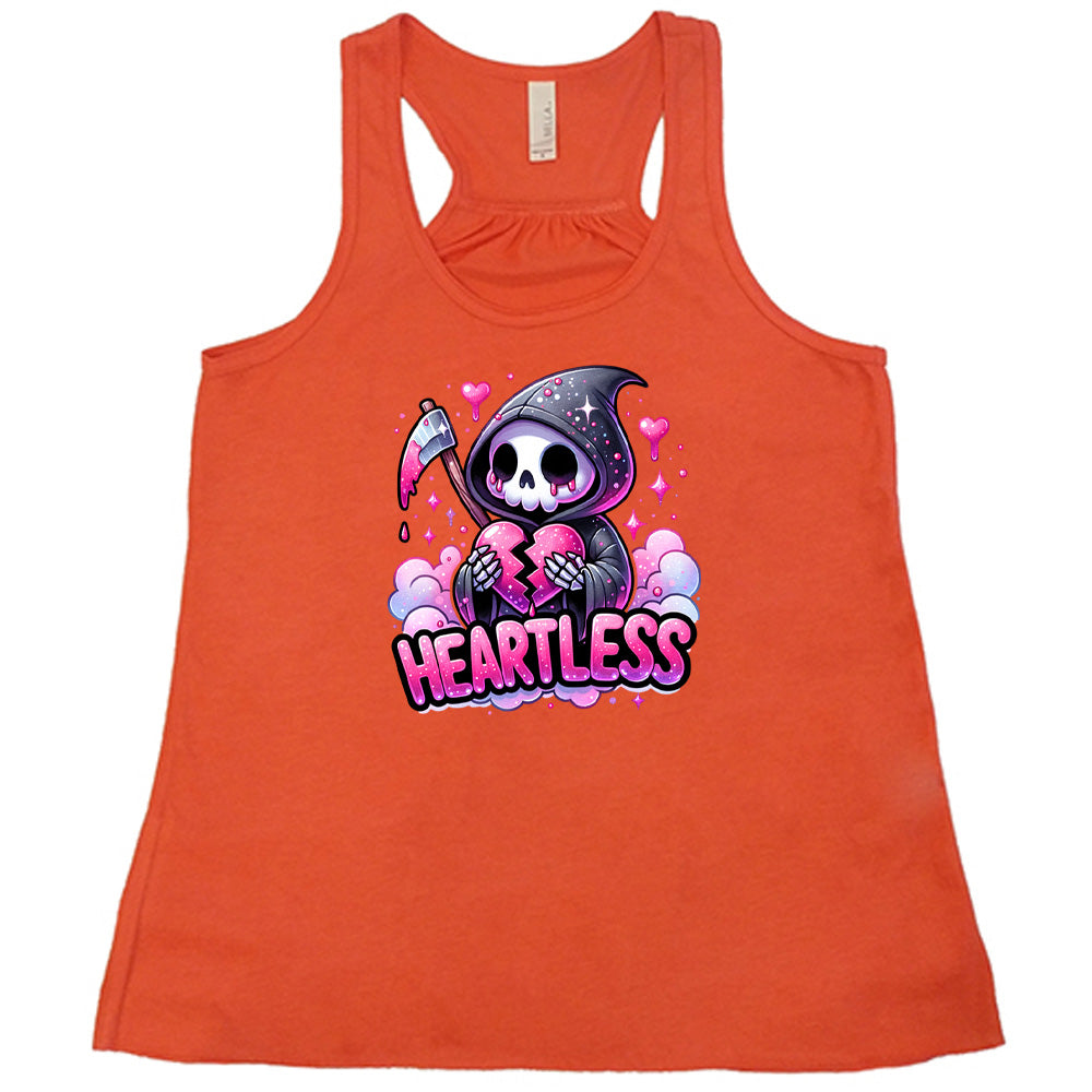 coral shirt with the text "Heartless" on it