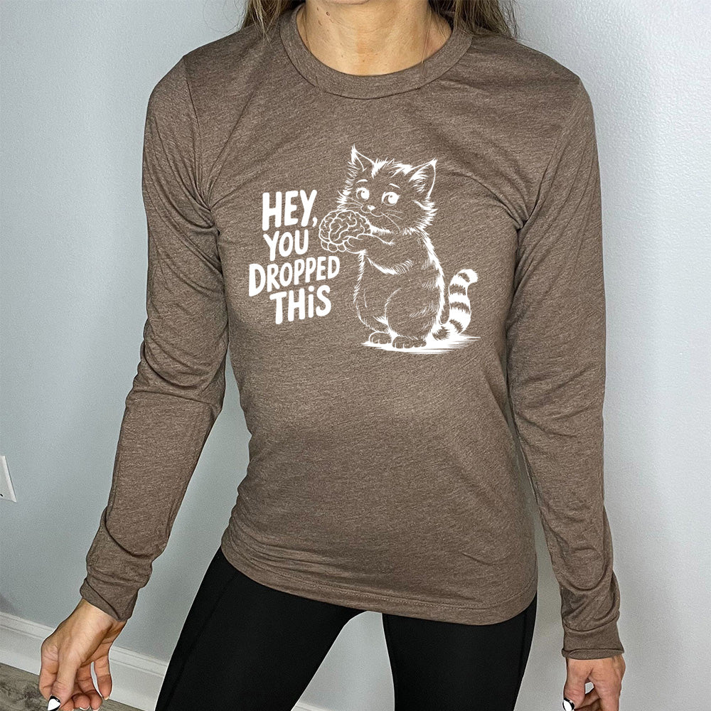 heather brown long sleeve with the words "Hey, you dropped this" and the graphic of a racoon holding a brain