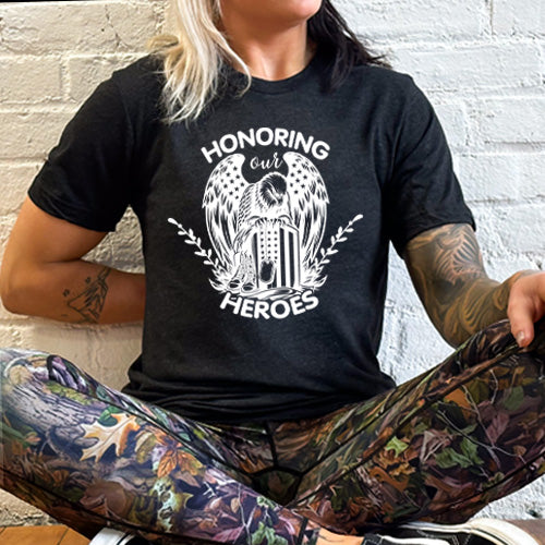 model wearing the "Honoring Our Heroes" black unisex shirt