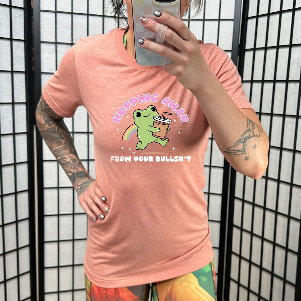 coral shirt with the text "Hopping Away From Your Bullshit" on it