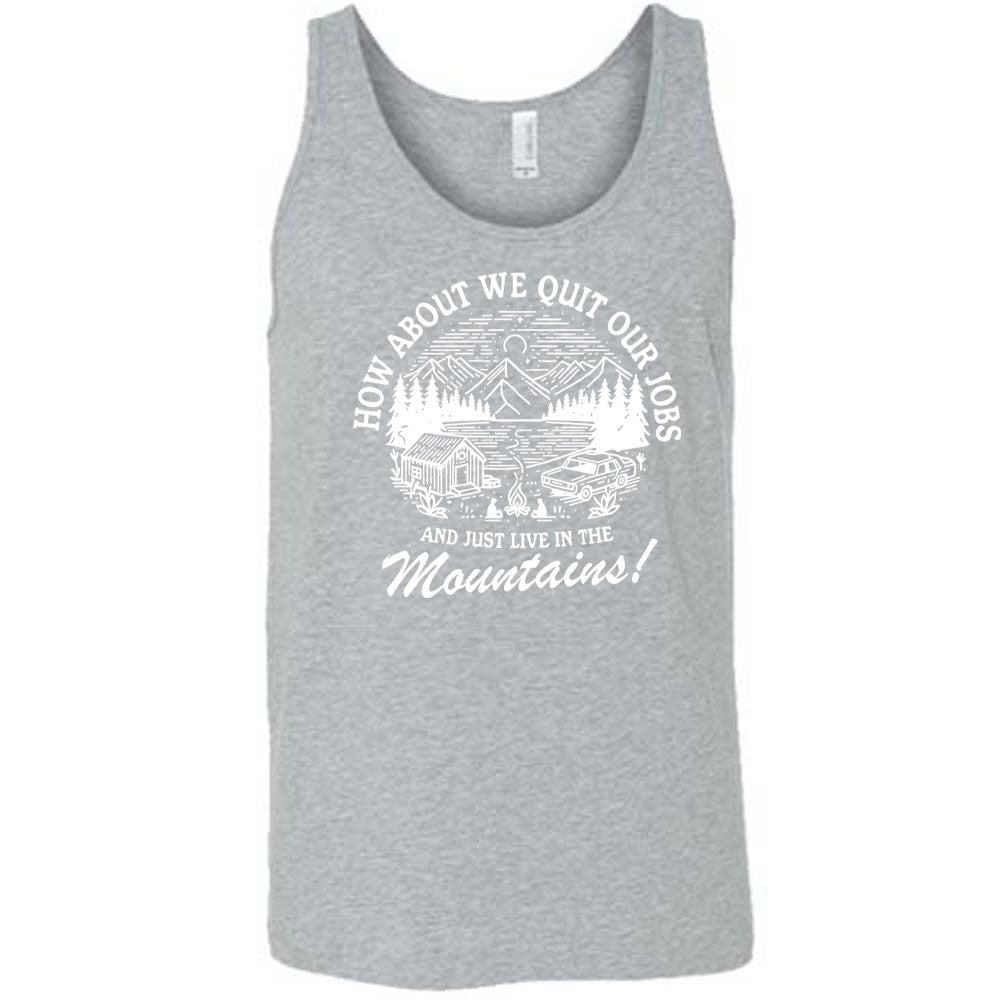 grey unisex tank with the words "How about we quit our jobs and just live in the mountains!" on it, with the graphic of a small house, a couple people sitting around a campfire, and an old car in the woods and mountains, with a sky and a couple stars and the moon