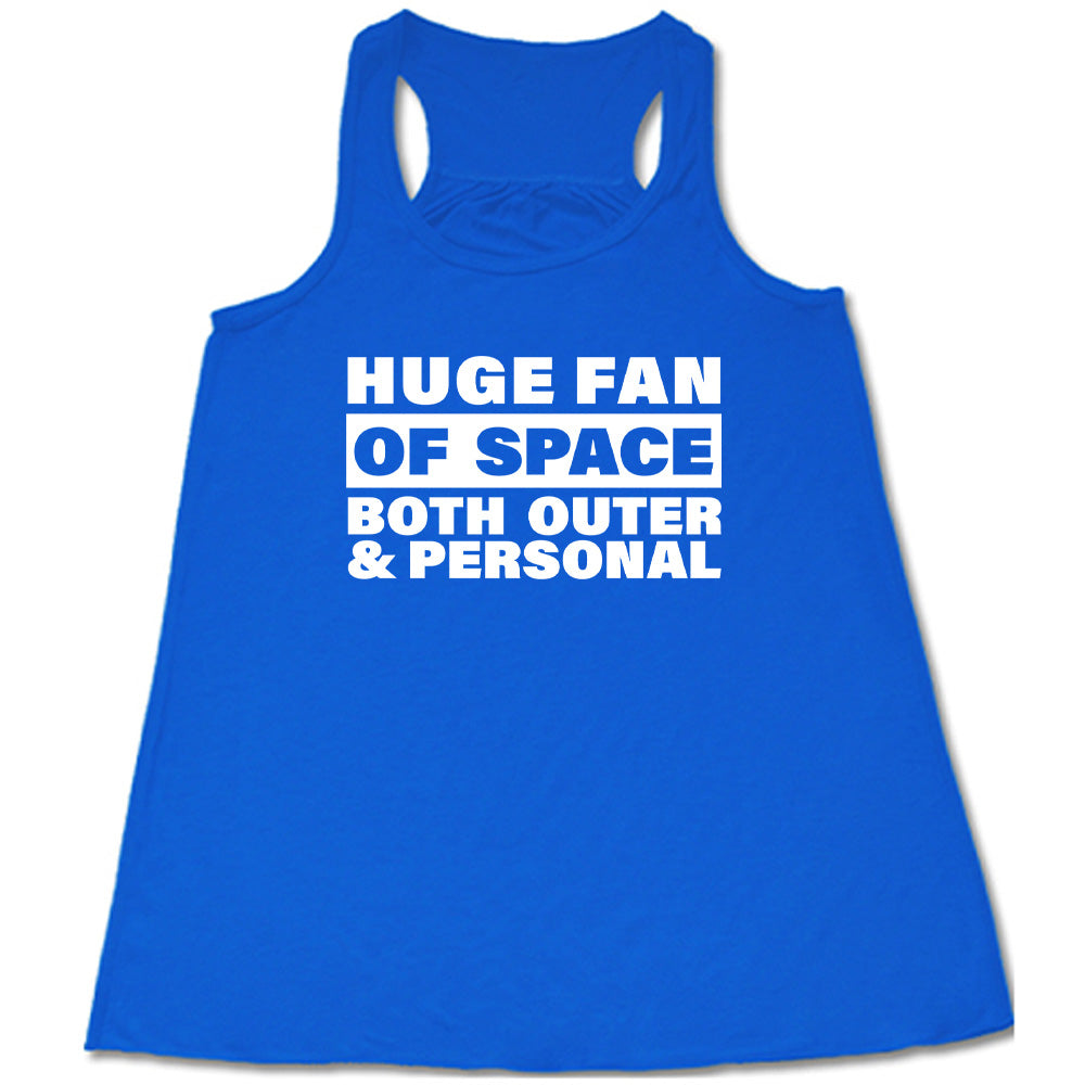 Blue colored flowy tank with a graphic on it that says "Huge Fan of Space, Both Outer and Personal" 