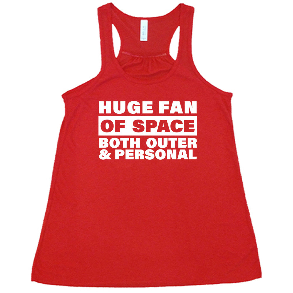Red colored flowy tank with a graphic on it that says "Huge Fan of Space, Both Outer and Personal" 
